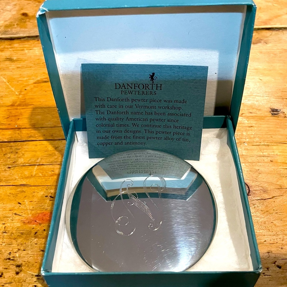 Inscribed Compact Mirror